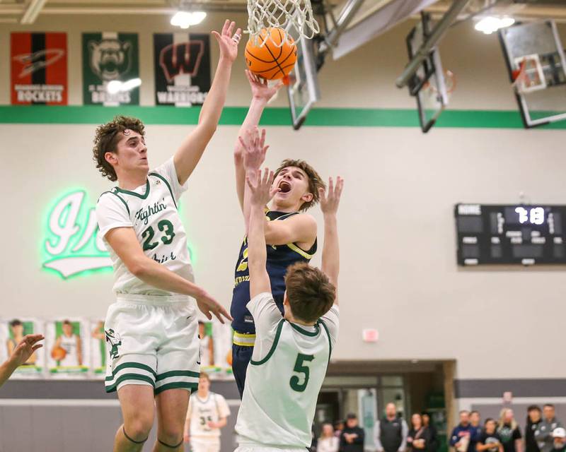 Yorkville Christian's Jordan Purvis (21) puts up a shot off of a steal during their Class 2A Seneca Sectional final basketball game between Bishop McNamara at Yorkville Christian, March 6, 2026 in Senaca.
