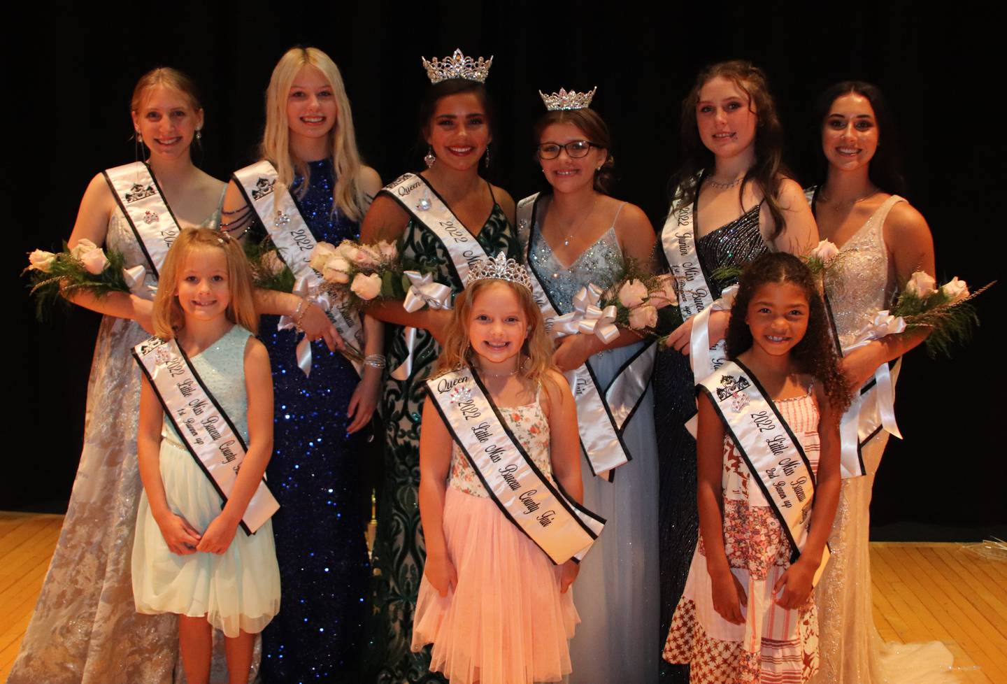 (Back, left to right) Miss Bureau County Fair second runner-up Madison Stanbary; Junior Miss second runner-up Genavyve Barnes; Miss Bureau County Fair Lexie Marquez; Junior Miss Bureau County Fair Isabella Bauer; Junior Miss first runner-up Melissa Heber; Miss Bureau County Fair first runner-up Mia Bowen pose for a group photo during the Bureau County Fair Queen Pageant.