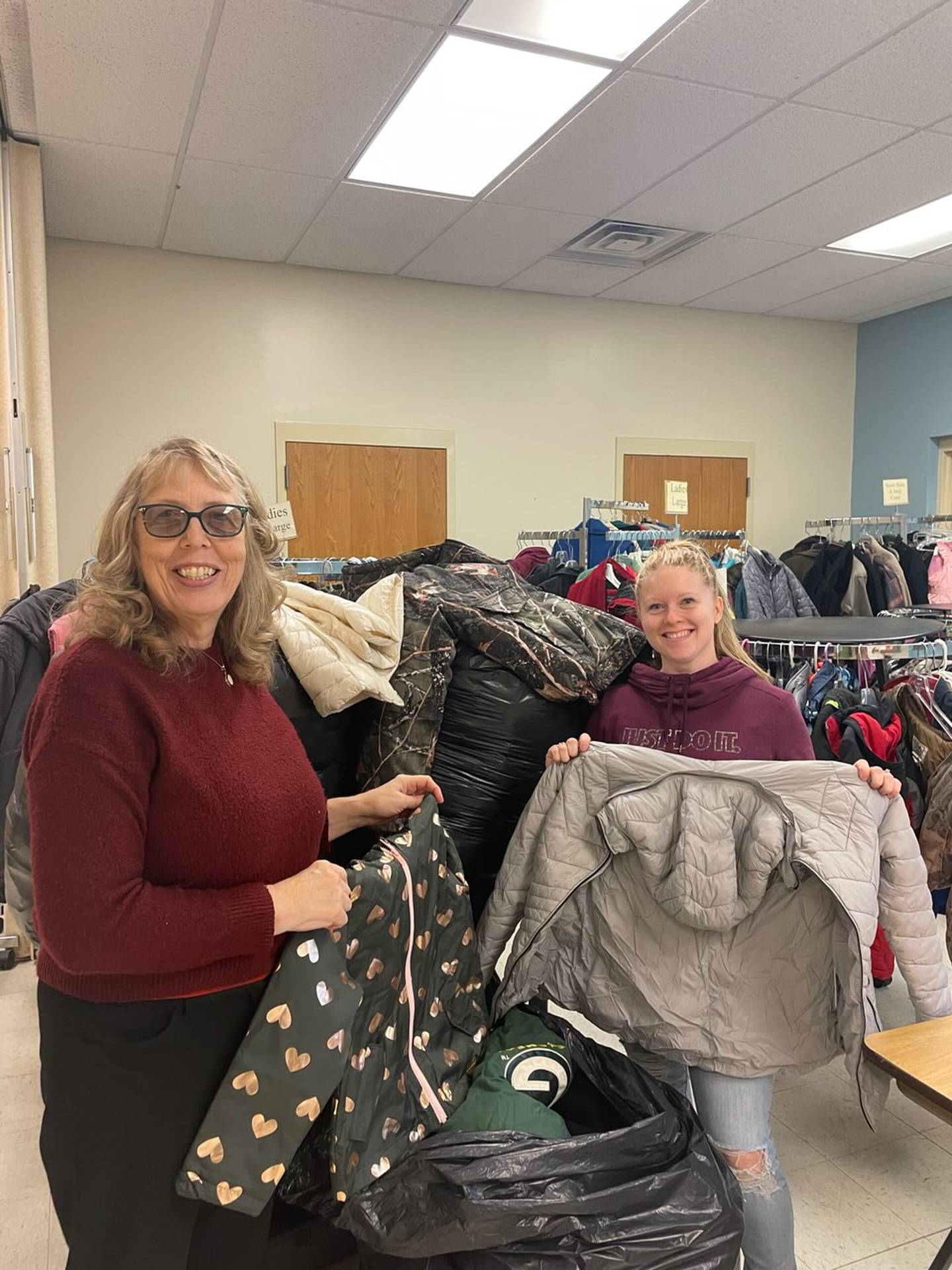 Coats were delivered to Streator Salvation Army from the Coats for Kids drive. Pictured is Judy Booze of the Salvation Army with Shaw Local Radio's Dani Holland.