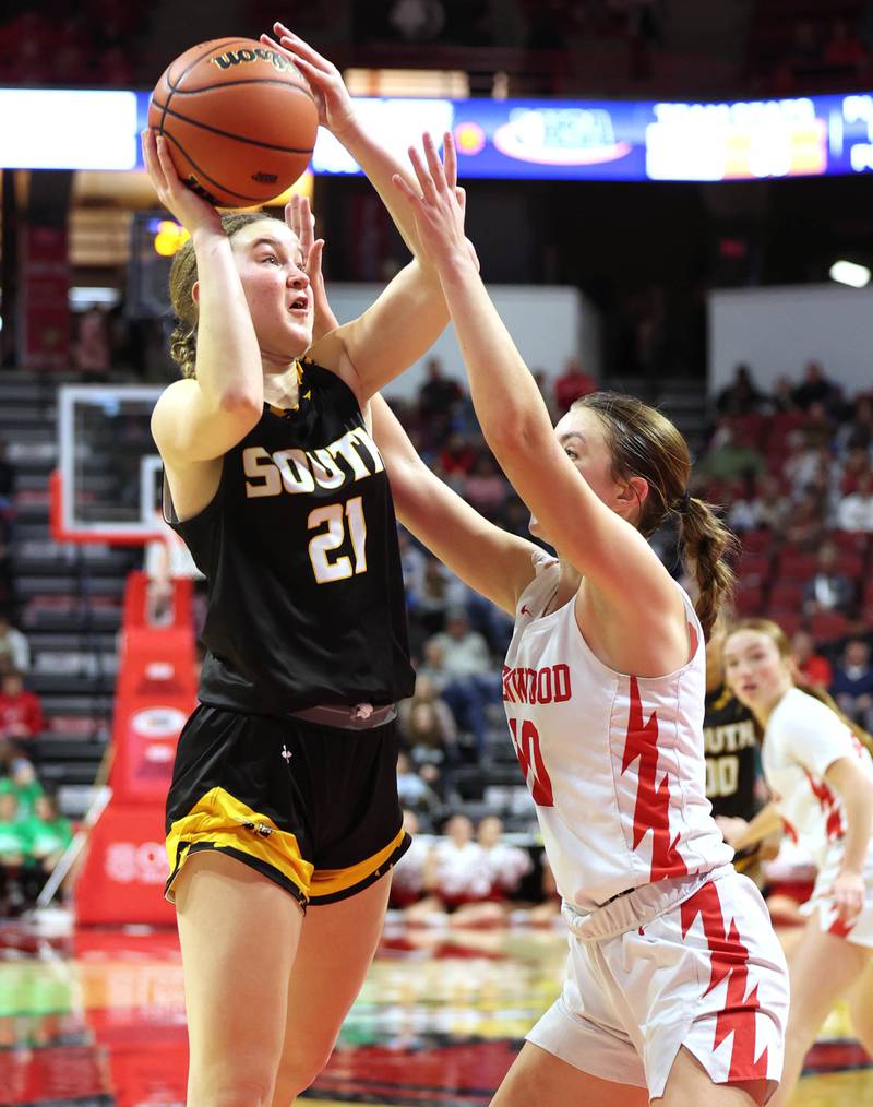 Hinsdale South's Maeve Savage shoots over Glenwood's Makenna Yeager during their game Friday, March 1, 2024, in the IHSA Class 3A state semifinal at the CEFCU Arena at Illinois State University in Normal.