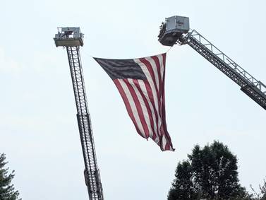 Area firefighters honor retired Oswego firefighter after his passing 