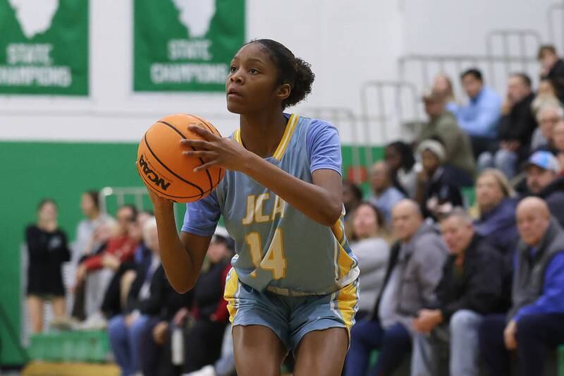 Joliet Catholic’s Laylah Carroll takes the outside shot against Providence on Saturday, Dec. 5, 2025 in New Lenox.