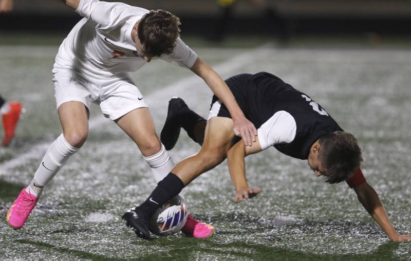 Crystal Lake Central's Nathan Gray and Prairie Ridge's Joshua Marineau battle for control of the ball during the IHSA Boys Soccer 2A Grayslake Central Sectional semifinal match on Tuesday, Oct. 29, 2024, at Grayslake Central High School.