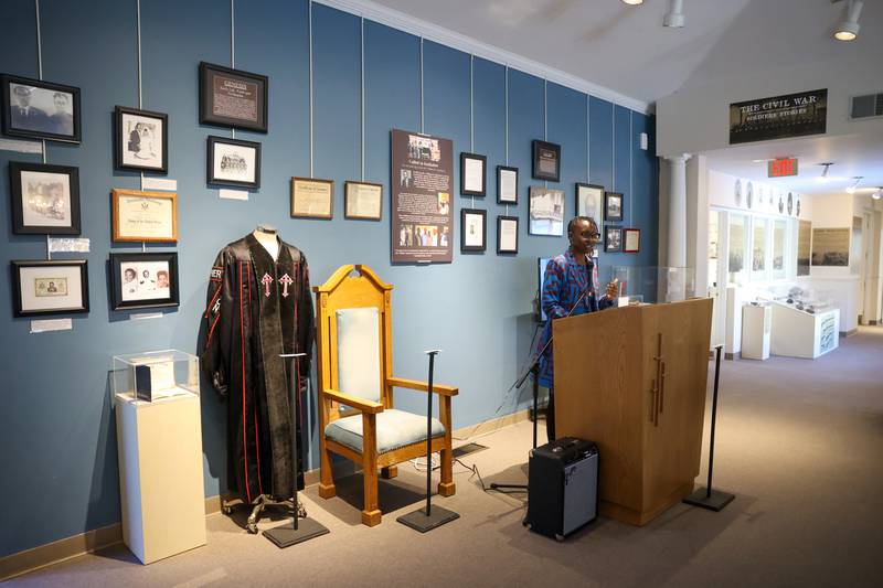 Monica Fountain, daughter of the late Kankakee civil rights leader Rev. William Copeland, gives a speech surrounded by items from his life during the opening of the exhibit 'Called to Kankakee: The Life and Legacy of the Rev. William H. Copeland Jr.' at the Kankakee County Museum on Saturday, Feb. 7, 2026.