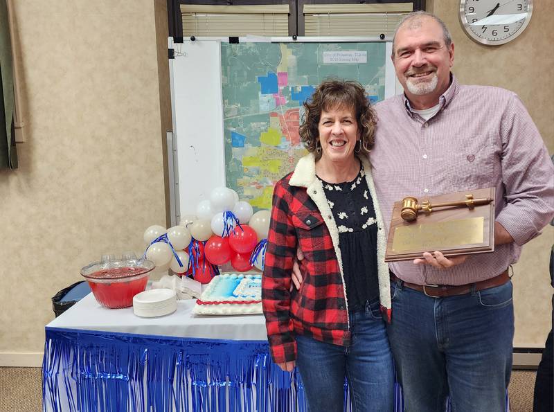 Mayor Joel Quiram was gifted an engraved gavel and decorative holder, along with a gold-plated badge, honoring his eight years as mayor and four years as a city council member.