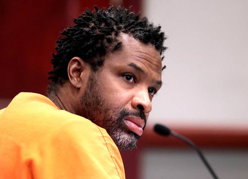 Matthew L. Martin listens to lead prosecutor Daniel Regna during a pretrial hearing Thursday, April 3, 2025, at the DeKalb County Courthouse in Sycamore. Martin is charged with robbing a DeKalb bank in July 2024.