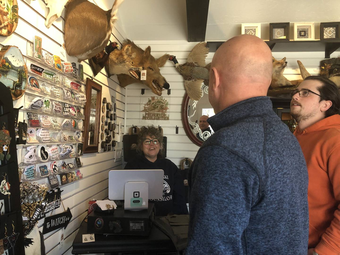 Don and Owen Schlicker talk with Preserved Peculiarities  owner Lori Fisher Oct. 26, 2024 in McHenry.