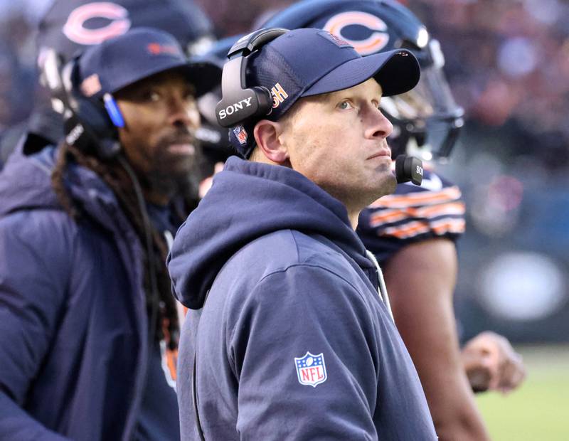 Chicago Bears head coach Ben Johnson watches a replay during their game against the Detroit Lions Sunday, Jan. 4, 2026, at Soldier Field in Chicago.