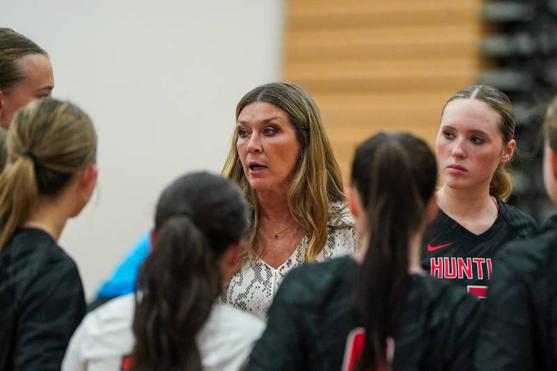 Huntley’s head coach Henry Soltesz talks to her team during a  non-conference match against St. Charles North at St. Charles North High School on Wednesday, Sept. 3, 2025.
