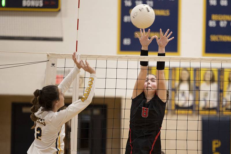 Fulton’s Kamryn Sikkema goes up for a block in game one of their semifinal regional match Wednesday, Oct. 26, 2022 against Polo.