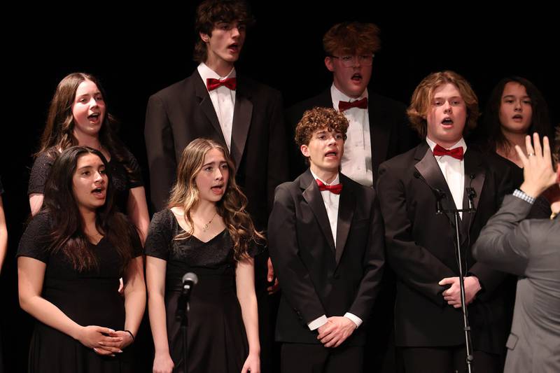 Members of the Montini Chamber Choir perform at the annual Spring Art Show and Concert on May 6. Pictured are (front l to r)  Arcy Pozo '26 (Downers Grove), Sammy Menapace '27 (Downers Grove), Nolan Ferris '25 (Wheaton), Jonny Kosinski '26 (Woodridge) (Back L to R) Maryfaith Considine '27 (Naperville), Michael May '26 (Villa Park), Michael Breier '27 (Downers Grove) and Jasmine Brunke '27 (Lombard)