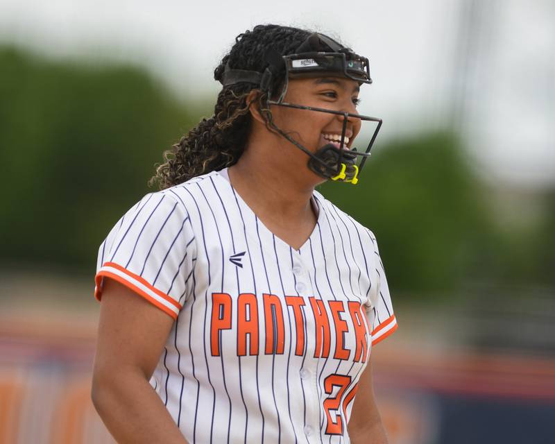 Oswego's Jaelynn Anthony (20) is all smiles after the last out was made securing a win over Benet Academy during the regional final game on Friday May 22, 2026, played at Oswego High School.