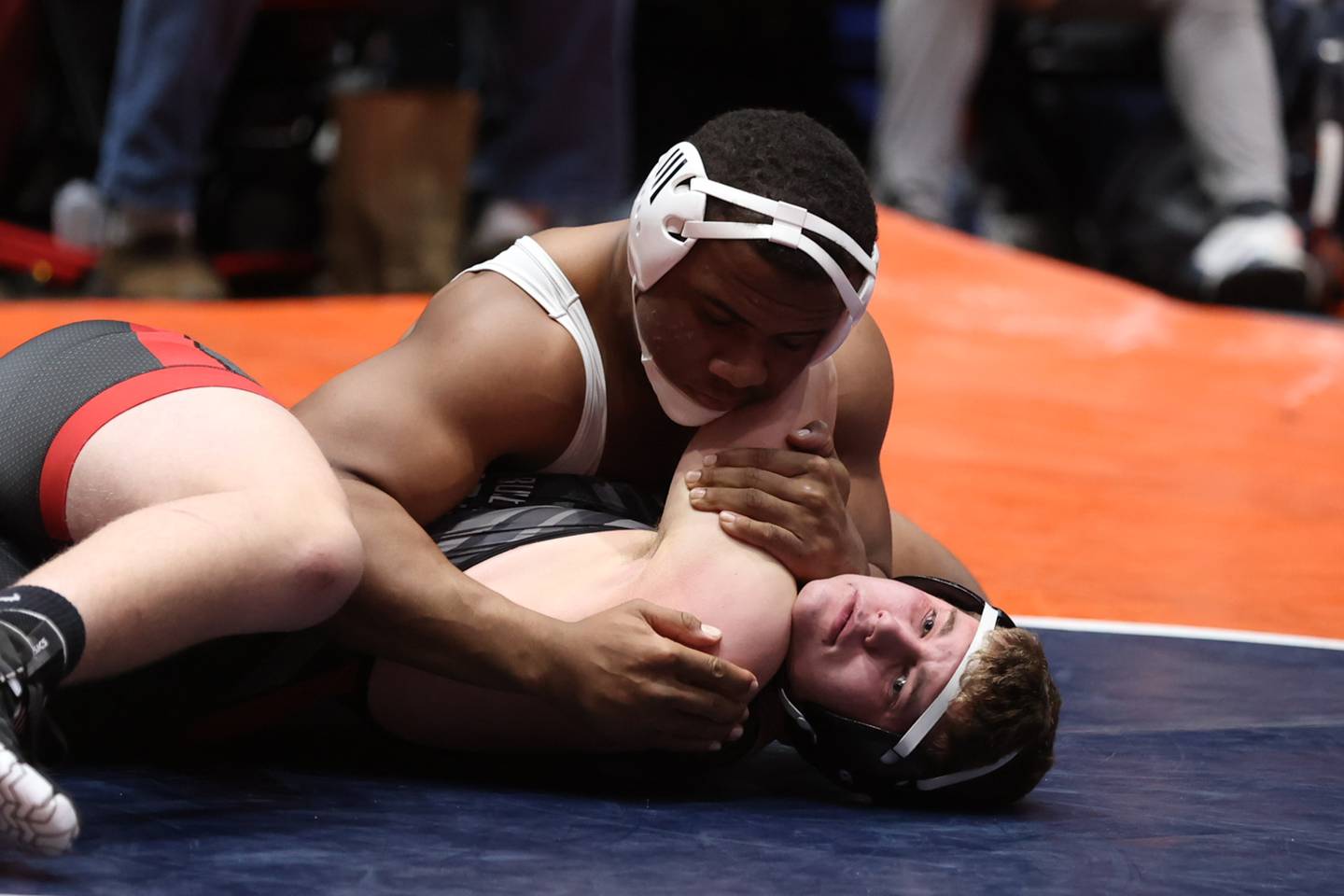 Joliet Catholic’s Dillan Johnson looks to pin Deerfield’s Garvin Crews in the Class 2A 285 pound dual team championship match at Grossinger Motor Arena in Bloomington. Saturday, Feb. 26, 2022, in Champaign.