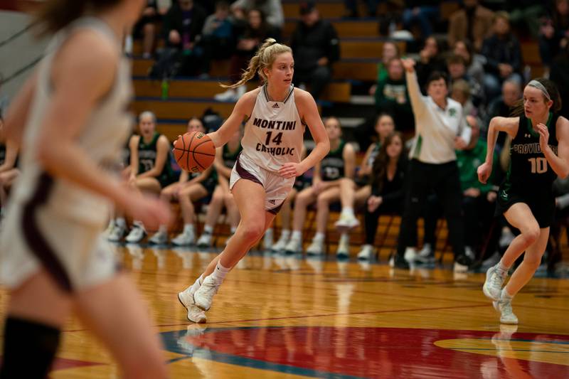 Montini’s Shannon Blacher (14) brings the ball up the court against Providence during the 3A Glenbard South Sectional basketball final at Glenbard South High School in Glen Ellyn on Thursday, Feb 23, 2023.