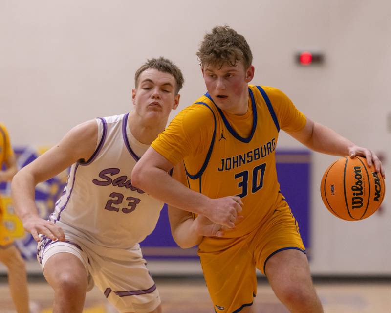 Jayce Schmitt drives the ball into the paint against Brady Lindsay of Rockford Lutheran during the IHSA 2A Sectional Championship game on March 6, 2026 at Mendota High School.
