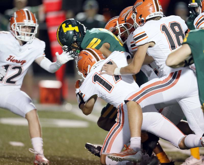 Fremd's Luke Mcilhon (12) moves the ball upfield on a kickoff Friday September 1, 2023 in Palatine.