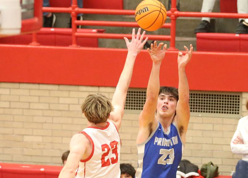 Princeton's Noah LaPorte shoots a jump shot over Ottawa's Owen Sanders on Monday, Feb. 3, 2025 in Kingman Gymnasium at Ottawa High School.
