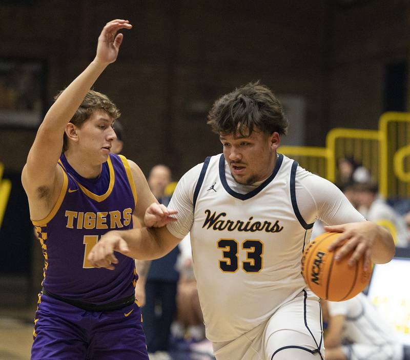 Sterling’s Maddux Osborn works against Sherrard’s Aidan Terronez Monday, Dec. 16, 2024, at Sterling High School.