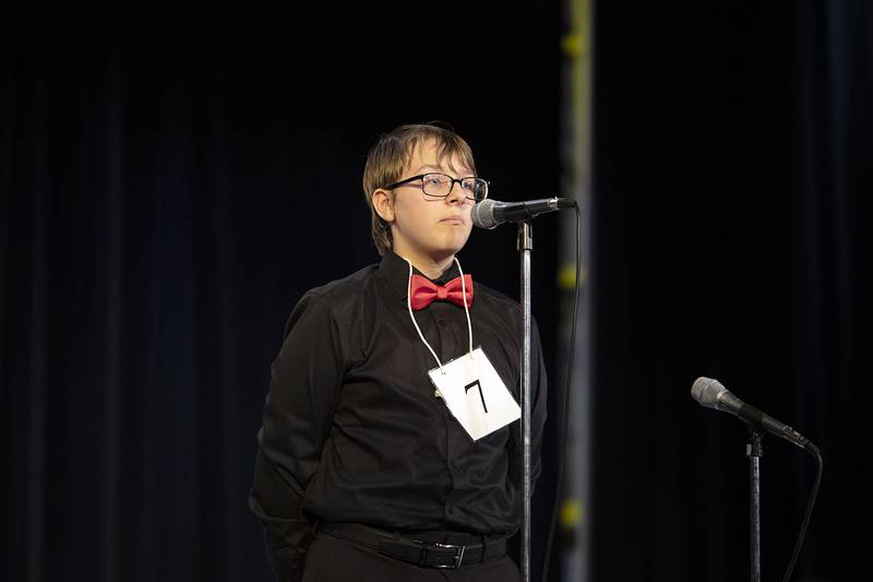 Morrison Jr. High seventh grader Mason Banks appears on stage Thursday, March 9, 2023 during the Lee-Ogle-Whiteside Regional Spelling Bee.