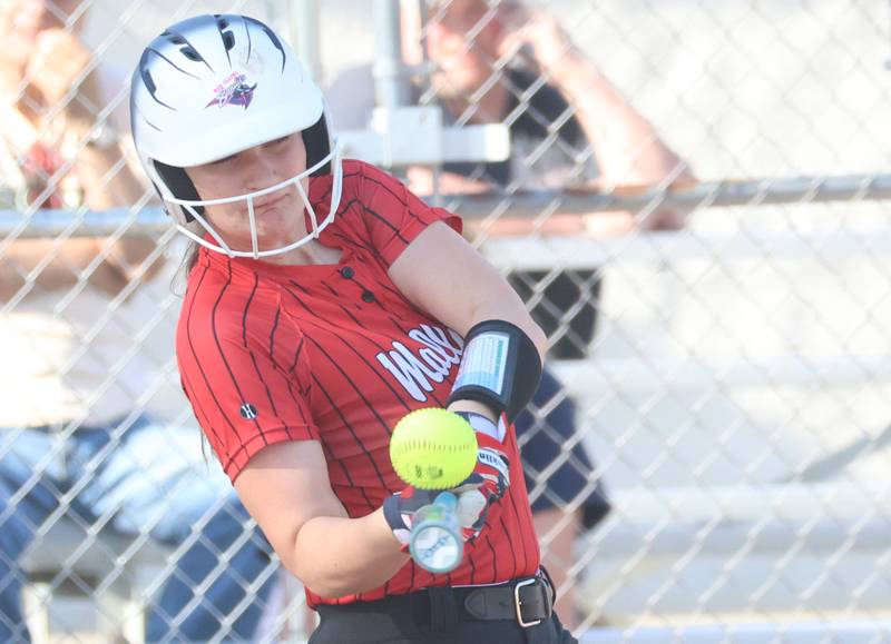 Henry-Senachwine's Emma Gaspardo makes contact with the ball against Marquette on Thursday, April 23, 2026 at June Cross Field in Ottawa.