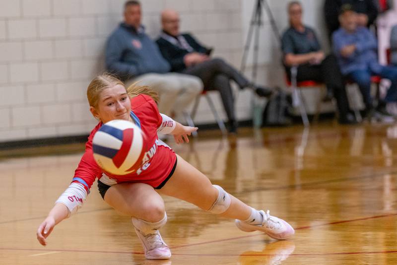 Bailey Etscheid of Ottawa High School dives for a shot from LaSalle Peru during the match at Sellett Gym on Oct. 15, 2025 at LaSalle-Peru High School.