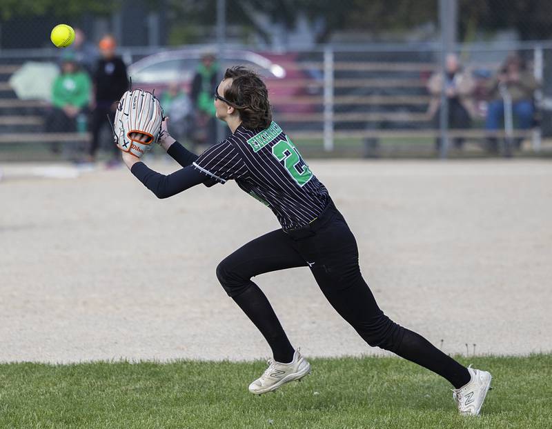 Rock Falls’ Madisyn Eikenberry makes a running catch in center against Dixon Thursday, May 7, 2026.