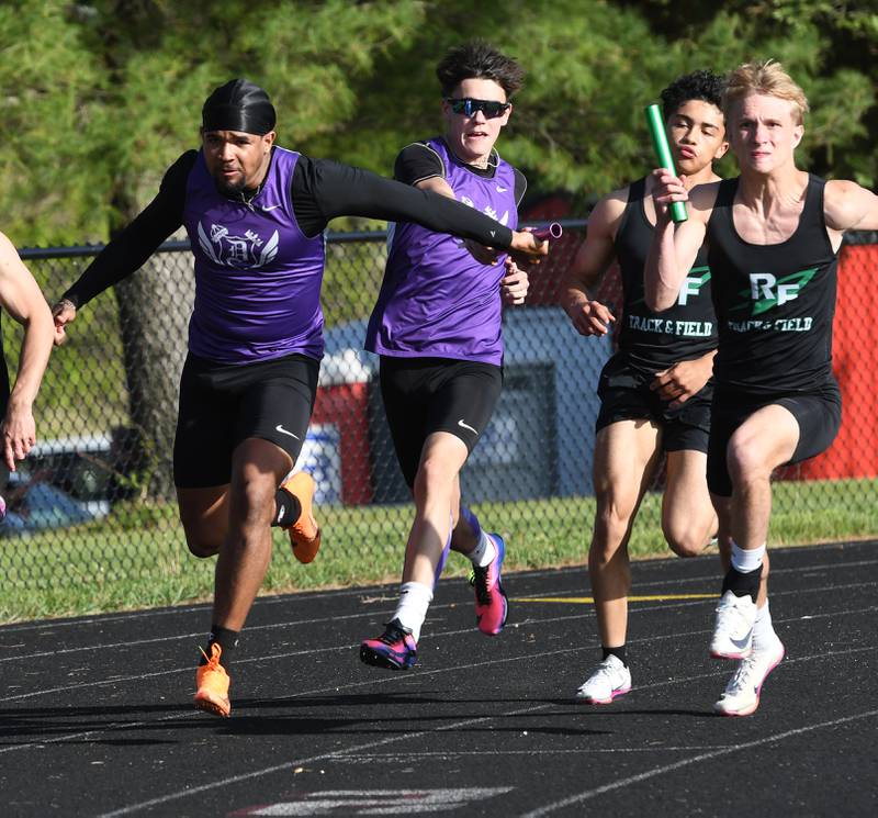 Dixon's Noah Flynn hands the baton to Quintynn Sarver and Rock Falls Alexavier Oquendo hands off to Logan Thome in the first exchange of the 4x100 relay elay at the Big Northern Conference Meet at Stillman Valley on Thursday, May 14, 2026.
