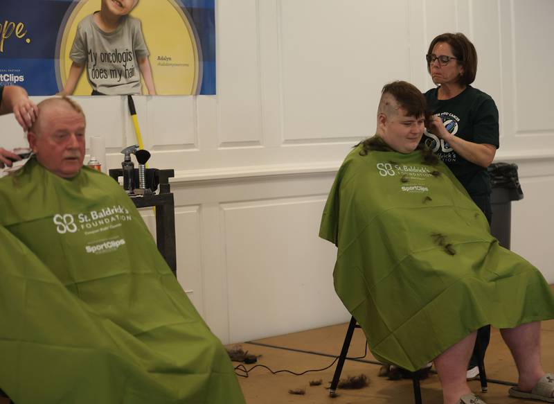 Ralph Moshage and John Boile have their head shaved during the 19th annual Illinois Valley Emergency Services Annual St. Baldrick's Event on Sunday, March 22, 2026 at Senica's Oak Ridge in La Salle. Moshage and Boile of the Waltham Scout Troop #250, raised the most money for this years St. Baldrick's event.
