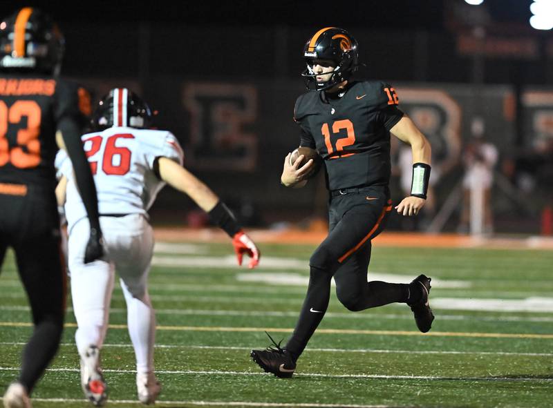 Lincoln-Way West's Grant Tustin (12) runs to the sideline during the conference game against Lincoln-Way Central on Friday, SEP. 19, 2025, at New Lenox.
