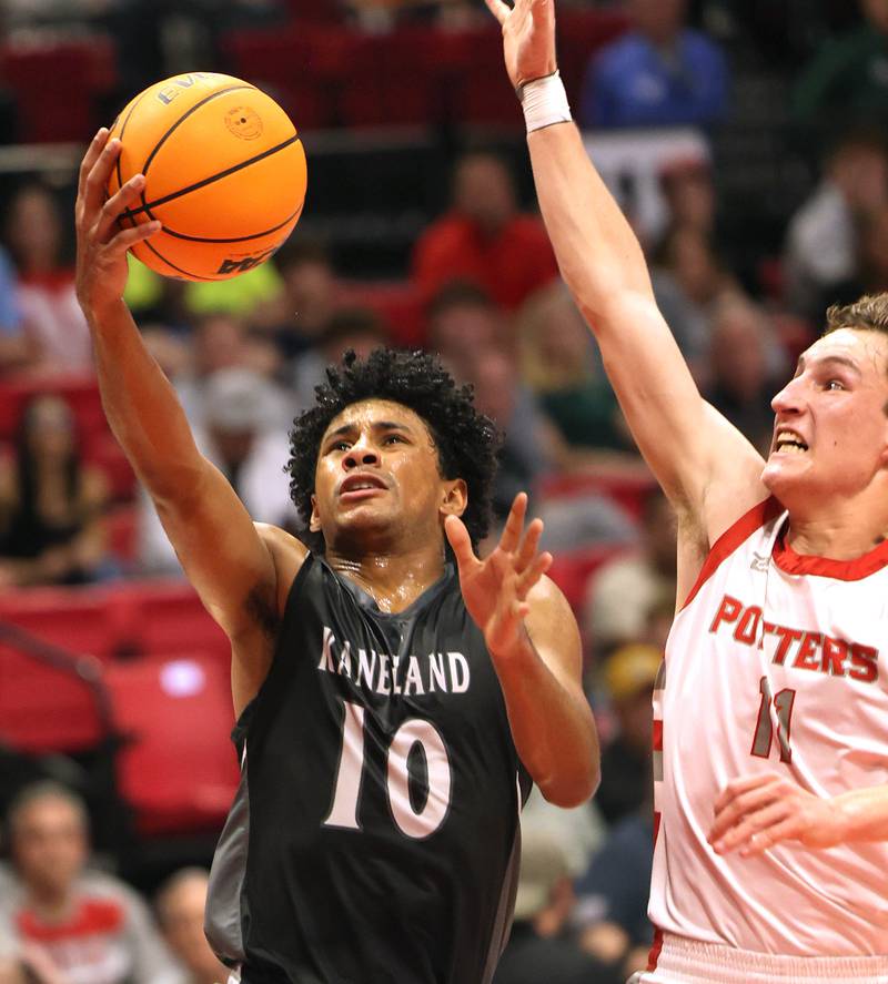 Kaneland's Jalen Carter goes to the basket in front of Morton's Owen Adams Monday, March 9, 2026, during their IHSA Class 3A supersectional matchup in the Convocation Center at Northern Illinois University in DeKalb.