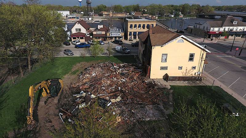 The Town Club’s additions were removed April 29, 2021, to reveal the original courthouse building in McHenry. A complete rehab of the building is planned.