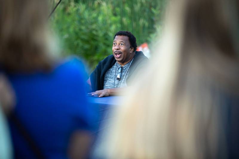 Leslie David Baker talks to fans at the Kane County Cougar's "The Office" Night at Northwestern Medicine Field on Thursday, July 14, 2022. Leslie David Baker played the character Stanley Hudson on the television show "The Office."