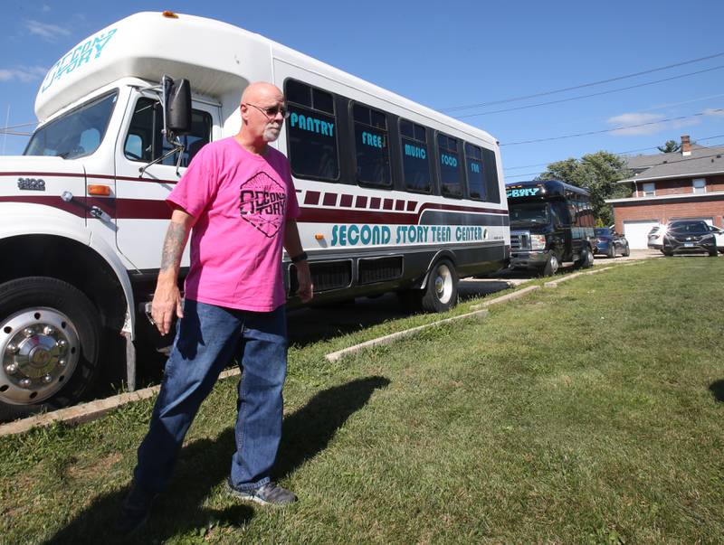 Jeff VanAutreve, founder of Second Story Teen Center, walks on the turf of a empty lot that will be the future home of the Second Story Teen Center at the intersection of Crown Street and South Main Street on Wednesday, Aug. 16, 2023 in Princeton.