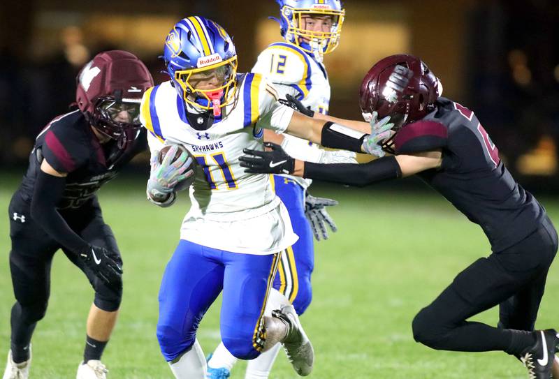 Johnsburg’s Ryan Franze runs the ball in varsity football at Rod Poppe Field on the campus of Marengo High School in Marengo on Friday, Oct. 3, 2025.