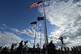 Photos: Raynor flies giant American flag