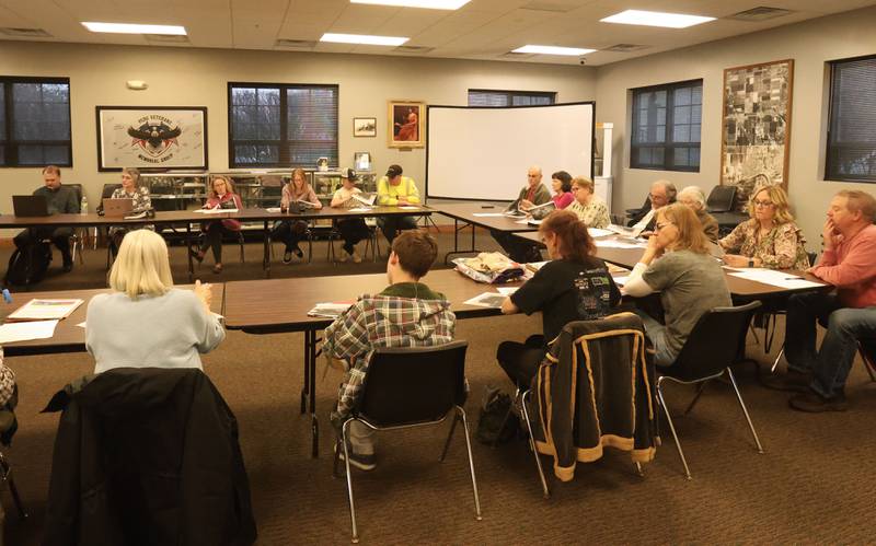 A view of vintage photos in a display case on Tuesday, March 31, 2026 at the Peru City Hall. The Peru Historical Society has collected the memorabilia. They are looking for items to donate to the growing collection. The group meets the last Tuesday of each month inside Peru City Hall at 6:30p.m.
