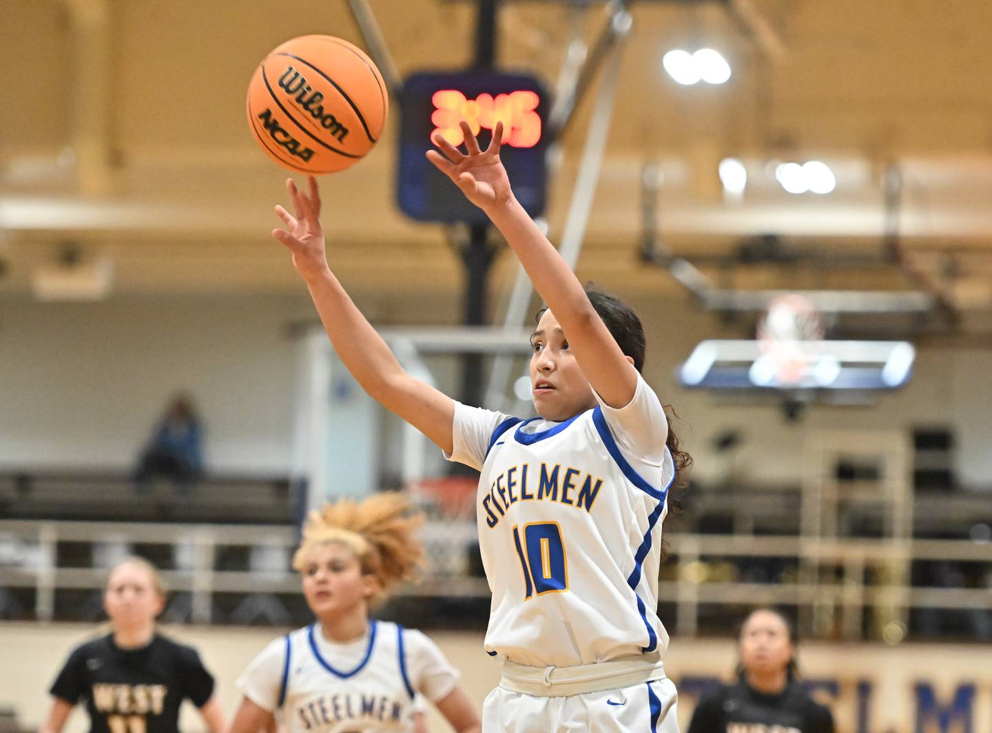 Joliet Central's Elena Moody (10) shoots a jump shot during the non-conference basketball game against Joliet West on Monday, Dec 02, 2024 at Joliet.