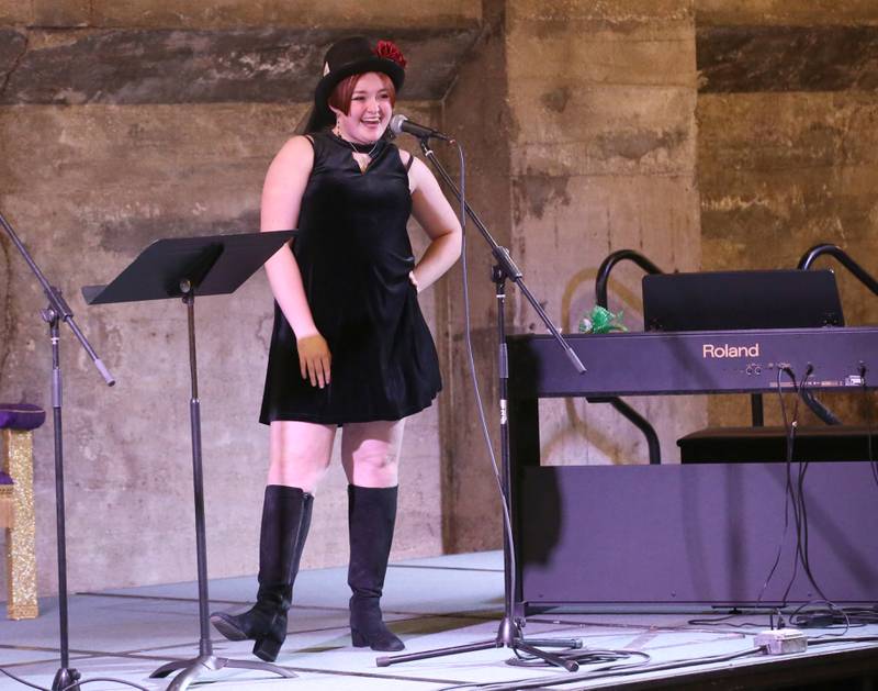 Brennan "Bird" Roden a senior at Princeton High School sings and acts during the 7th annual Mad Hatter Ball on Friday, Nov. 17, 2023 at the Westclox Event Center in Peru.