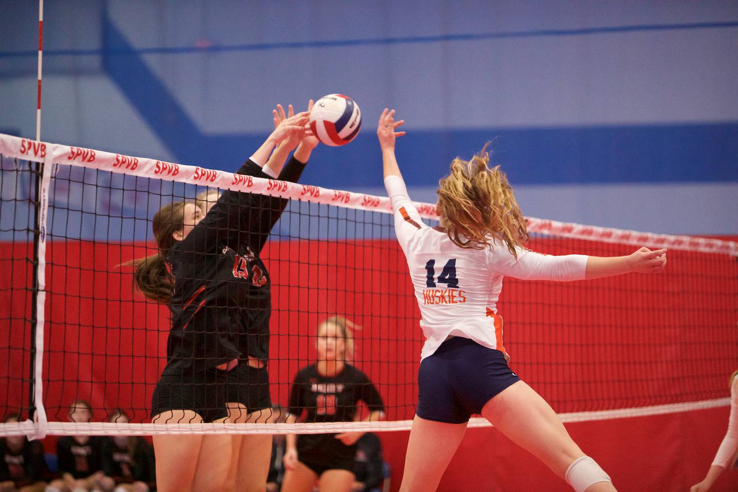 Naperville North's Paige Lauterwasser shot is blocked by Benet during the Championship match at the St. Charles East Scholastic Cup Tournament on Saturday, Oct.8,2022 in Aurora.
