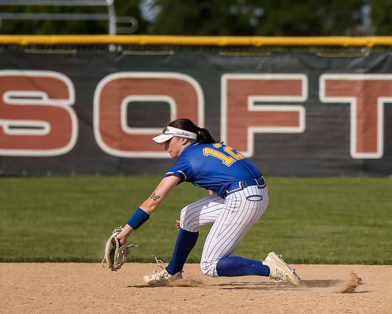 Wheaton North's Macy Pomatto (12) makes a stab at second during Class 4A Plainfield North Sectional final softball game between Wheaton North at Oswego. May 31th, 2024.