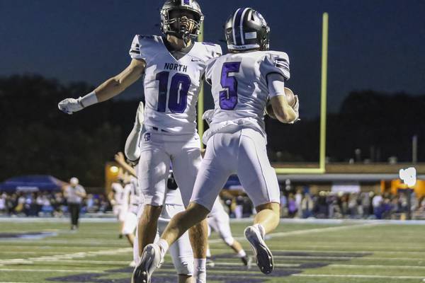 Photos: Downers Grove North, Downers Grove South renew rivalry on the gridiron