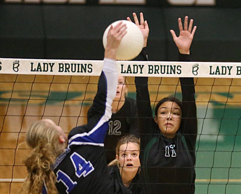 Newark's Lauren Ulrich spikes the ball past St. Bede's Amanda Wojcik (11) in the Class 1A Regional title game on Thursday, Oct. 27, 2022 at the Academy in Peru.