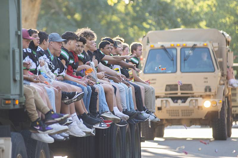 The Rock Falls Rockets football team throws candy from their float Thursday, Sept. 22, 2022 during the homecoming parade. The team will face Genoa-Kingston Friday night.
