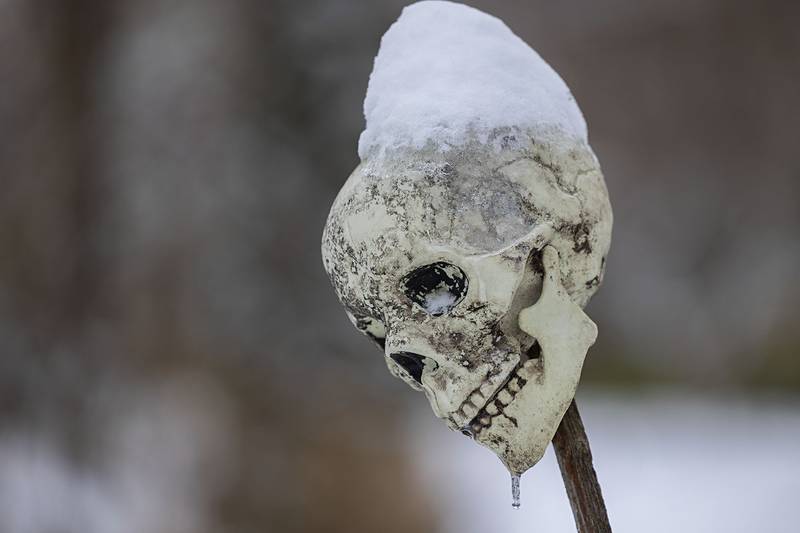 A Halloween decoration gets the Christmas treatment Sunday, Nov. 30, 2025, after the heavy snow fall.