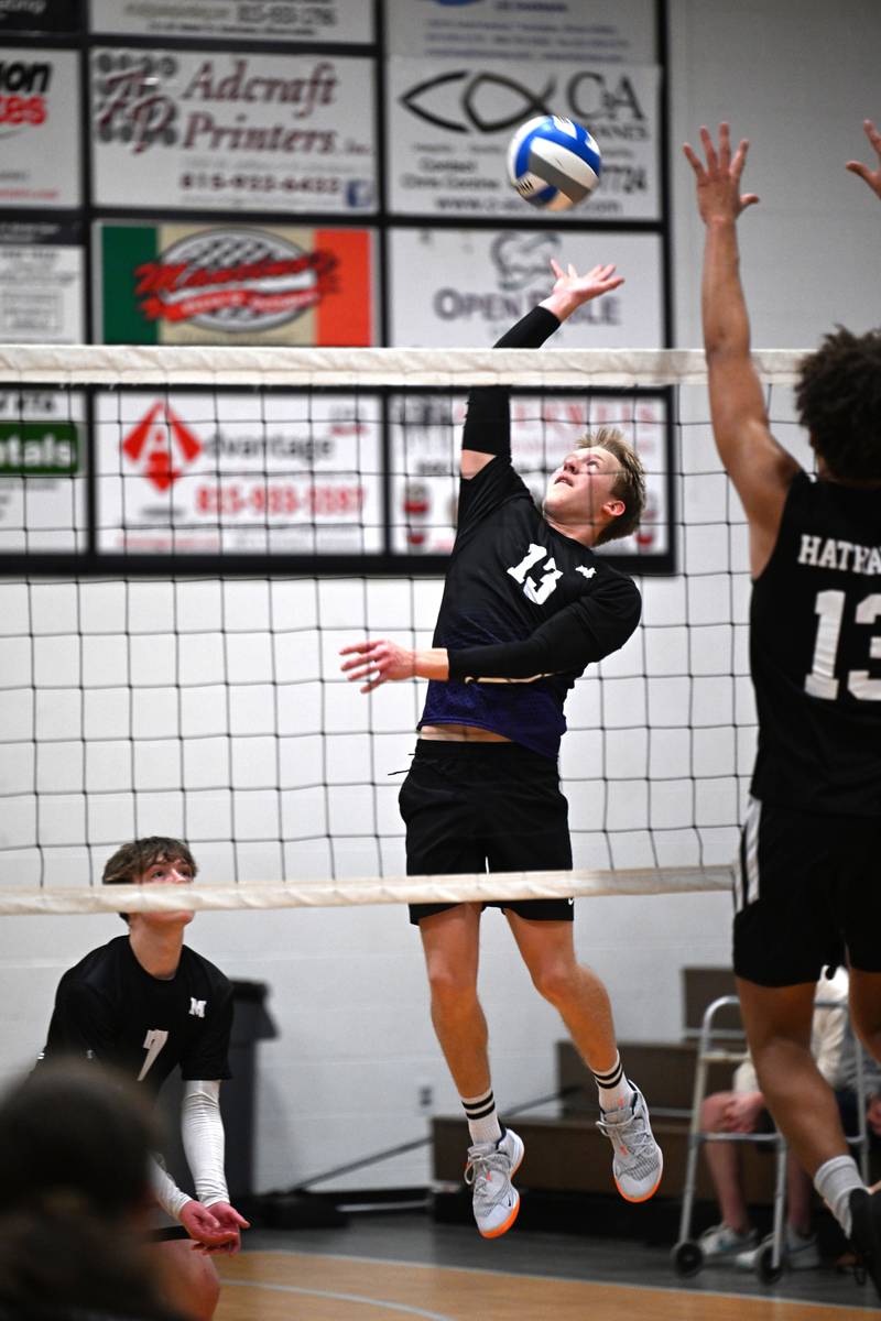 Manteno's Mason McElroy aims for over the net at the game against Kankakee Trinty Academy on Thursday, May 1, 2025.