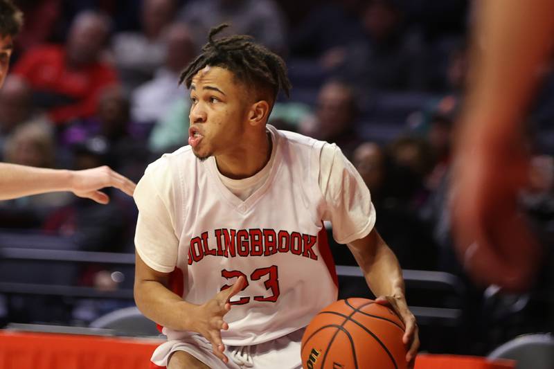 Bolingbrook’s Daniel Walker look for a play against Glenbard West in the Class 4A semifinal at State Farm Center in Champaign. Friday, Mar. 11, 2022, in Champaign.