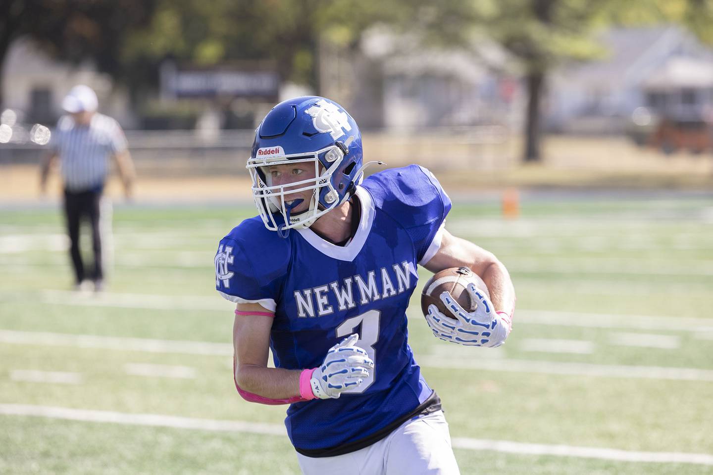 Newman’s George Jungerman looks for room to run after catching a pass against Mercer County Saturday, October 4, 2025.