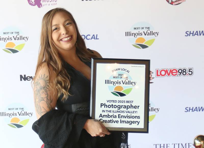 Ambria Envisions Creative Imagery, poses for a photo during the second annual Best of the Illinois Valley event on Thursday at the Auditorium Ballroom in La Salle.