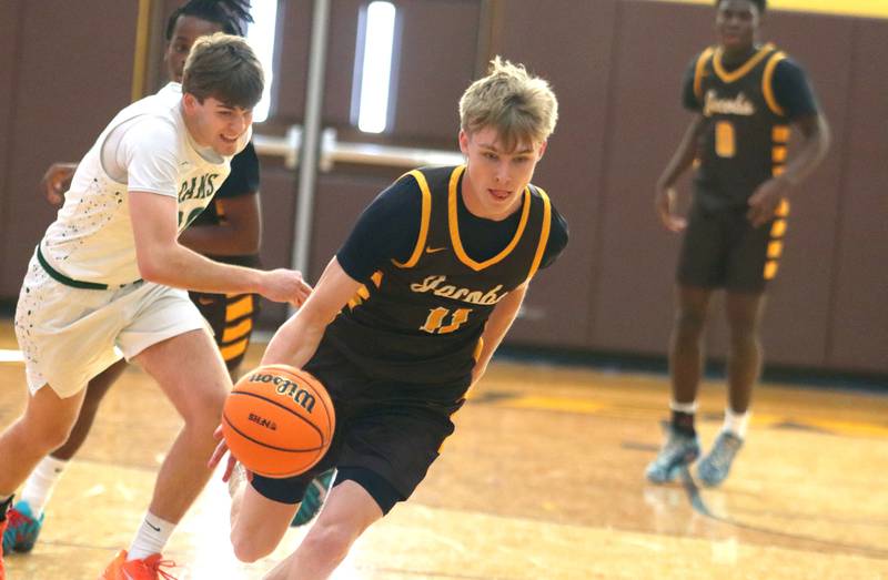 Jacobs’ Carson Goehring runs a fast break against Grayslake Central in varsity boys basketball Hinkle Holiday Classic action on Tuesday, Dec. 23, 2025, at Jacobs High School in Algonquin.