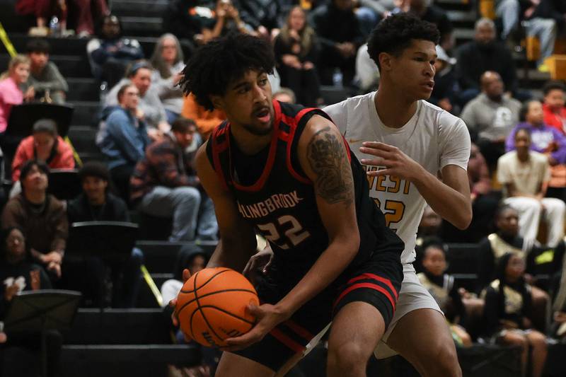 Bolingbrook’s JT Pettigrew looks for a play against Joliet West on Friday, Jan 24, 2025 in Joliet.